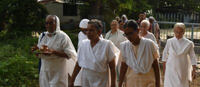 Processing to the cremation site to collect Nirmal-di’s ashes/bones. Photograph by the author.